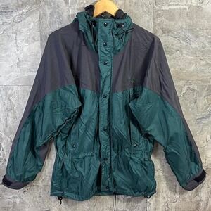 Green and black Solstice jacket  Woman's Small Rip in hood shown #outdoorjacket